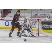 Vancouver Giants right wing Justin Lies vs. the Kamloops Blazers
